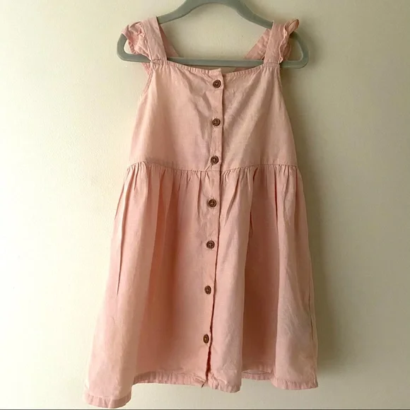 H&M girls light pink dress in size 3-4 with wooden buttons